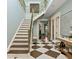 Grand staircase with skylight and geometric railing at 817 Antonette Ave, Winter Park, FL 32789