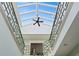 Skylight illuminating a grand staircase at 817 Antonette Ave, Winter Park, FL 32789