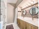 Elegant bathroom with double vanity and pebble tile at 960 Seminole Ave, Altamonte Springs, FL 32701