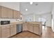 Galley kitchen with stainless steel appliances and ample cabinetry at 1000 Karen Ridge Ct, Kissimmee, FL 34747