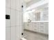 Elegant bathroom with white cabinets and a glass-enclosed shower at 1062 Liliana Dr, Deland, FL 32724
