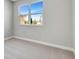 Bright bedroom with large window, carpet flooring, and a spacious closet at 1062 Liliana Dr, Deland, FL 32724