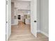 Bedroom with view of kitchen and light flooring at 1062 Liliana Dr, Deland, FL 32724
