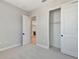 Bedroom with closet and view of kitchen at 1062 Liliana Dr, Deland, FL 32724
