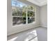 Bright and airy bedroom with a large window offering natural light at 1062 Liliana Dr, Deland, FL 32724