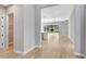 Open concept entryway leading to the living room and kitchen at 1062 Liliana Dr, Deland, FL 32724