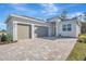 Two-car garage and paver driveway at 1062 Liliana Dr, Deland, FL 32724