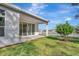 New home with covered patio and grassy backyard at 1062 Liliana Dr, Deland, FL 32724