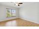 Bedroom with large window and ceiling fan at 11815 Pethrick Dr, Orlando, FL 32824