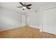 Bedroom with double doors and ceiling fan at 11815 Pethrick Dr, Orlando, FL 32824