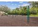 Green metal swings set at a playground at 11815 Pethrick Dr, Orlando, FL 32824