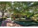 Brick walkway, lush landscaping and a charming house exterior at 140 Dana Way, Winter Park, FL 32789