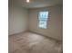 Bright bedroom featuring a large window at 1421 Arbor Hill Dr, Deltona, FL 32725