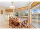 Bright dining area with wood table and chairs at 1447 Malaluka St, Deltona, FL 32725