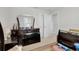 Bedroom with dresser and large mirror at 16085 Pebble Bluff Loop, Winter Garden, FL 34787