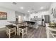 Kitchen features a dining area with a rustic wooden table and chairs at 1630 W New York Ave, Orange City, FL 32763