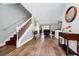 Hardwood floor entryway with view of staircase and living area at 1927 Chatham Place Dr, Orlando, FL 32824
