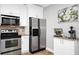 Updated kitchen, stainless steel appliances, granite counters at 1927 Chatham Place Dr, Orlando, FL 32824