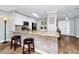 Kitchen with granite countertops, stainless steel appliances, and breakfast bar at 1927 Chatham Place Dr, Orlando, FL 32824