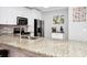Modern kitchen with granite countertops and breakfast bar at 1927 Chatham Place Dr, Orlando, FL 32824