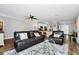 Open living room with comfortable seating and hardwood floors at 1927 Chatham Place Dr, Orlando, FL 32824
