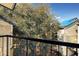 Balcony with scenic views of trees and neighboring building at 1964 Lake Atriums Cir # 175, Orlando, FL 32839