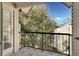 Private balcony offering tranquil views of the surrounding landscape at 1964 Lake Atriums Cir # 175, Orlando, FL 32839