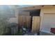 Home's side yard with wooden fence and storage at 2035 W Gore St, Orlando, FL 32805