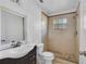 Bathroom with a vanity, toilet, and walk-in shower at 2481 Lake Helen Osteen Rd, Deltona, FL 32738