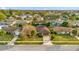 Aerial view of a residential neighborhood, showcasing houses and surrounding landscape at 2712 Ceram Ave, Orlando, FL 32837