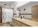 Clean bathroom with single vanity and shower/tub at 2712 Ceram Ave, Orlando, FL 32837