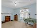 Bright bedroom with a ceiling fan, a large window and space for personalized furnishings at 2712 Ceram Ave, Orlando, FL 32837