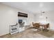 Kitchen dining area with wood table and chairs at 2712 Ceram Ave, Orlando, FL 32837