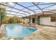 Relaxing screened pool with ample deck space at 2712 Ceram Ave, Orlando, FL 32837