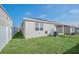House exterior and AC unit in backyard at 283 Archer Way, Haines City, FL 33844