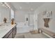 Bathroom with double vanity, soaking tub, and shower at 283 Archer Way, Haines City, FL 33844