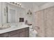 Clean bathroom with shower and grab bar at 283 Archer Way, Haines City, FL 33844