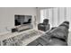Living area with sectional and recliner at 283 Archer Way, Haines City, FL 33844