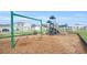Community playground with swings and playset at 283 Archer Way, Haines City, FL 33844