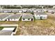 Aerial view showing home's location in a quiet residential neighborhood at 3037 Cassidy Ln, Haines City, FL 33844