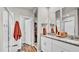 Double vanity bathroom with granite countertops and walk-in shower at 3037 Cassidy Ln, Haines City, FL 33844