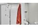 Bathroom with a toilet, shower and storage at 3037 Cassidy Ln, Haines City, FL 33844