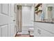 Bathroom with shower/tub combo and granite countertop at 3037 Cassidy Ln, Haines City, FL 33844