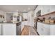 Modern kitchen with granite countertops and stainless steel appliances at 3037 Cassidy Ln, Haines City, FL 33844