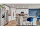 Modern kitchen with stainless steel appliances and a large island at 3037 Cassidy Ln, Haines City, FL 33844