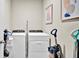 Laundry room with washer, dryer, and vacuum at 3037 Cassidy Ln, Haines City, FL 33844