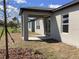 Exterior view of back porch and fresh landscaping in the backyard of the home at 329 Conway Ave, St Cloud, FL 34771