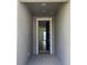 Inviting entryway with neutral paint and open view into the home at 329 Conway Ave, St Cloud, FL 34771
