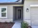 Inviting entryway with stone accents and an open view into the home at 329 Conway Ave, St Cloud, FL 34771