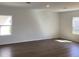 Spacious living room with wood flooring and abundant natural light at 329 Conway Ave, St Cloud, FL 34771